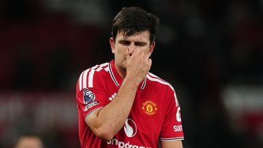 Harry Maguire shows his dejection as he leaves the pitch