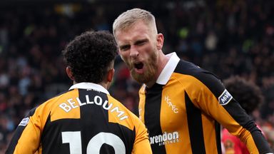 Oli McBurnie celebrates scoring his team’s first goal with team-mate Mohamed Belloumi