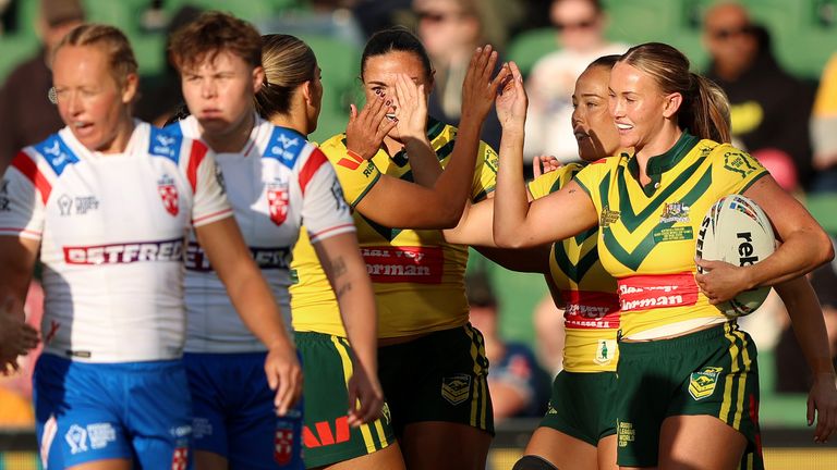 Jaime Chapman celebrates scoring the first of Australia's 15 tries