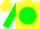 Yellow body, green disc, green arms, yellow cap