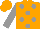 Orange, grey dots, grey sleeves, orange cap